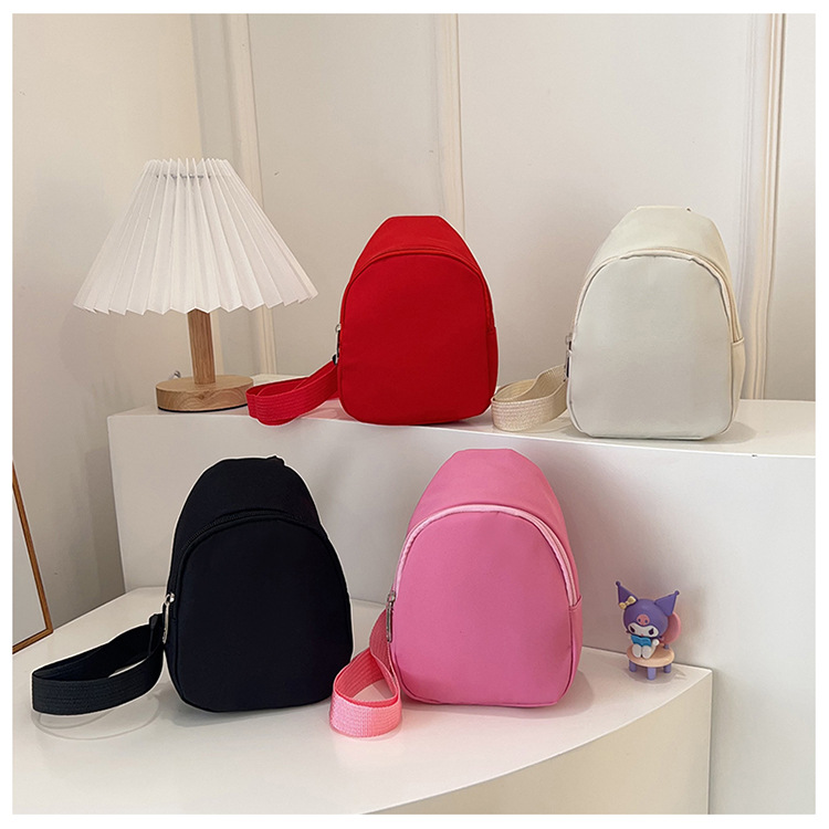 The new children's solid color lightweight and versatile chest bag is simple, trendy and fashionable. It is a single-shoulder crossbody bag for boys and girls details Picture