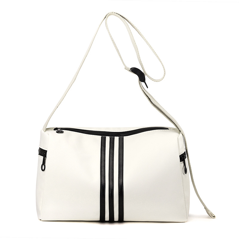 This is a simple, fashionable, casual and versatile crossbody bag for women, suitable for commuting. It is a large-capacity striped single-shoulder bag for both men and women Item Picture