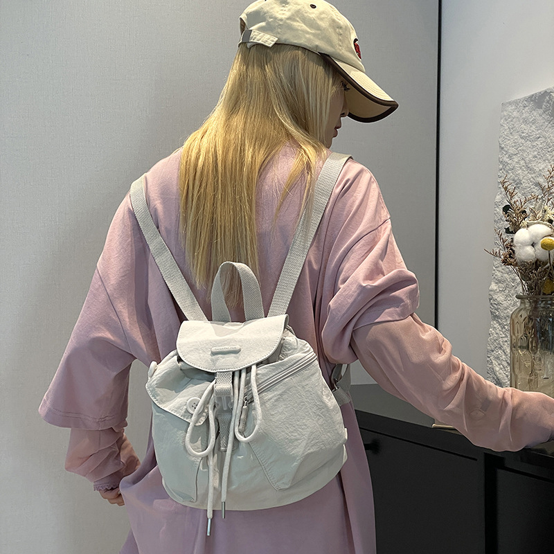 Colorful Fox's new Korean-style ins women's niche design lightweight pocket button drawstring backpack details Picture