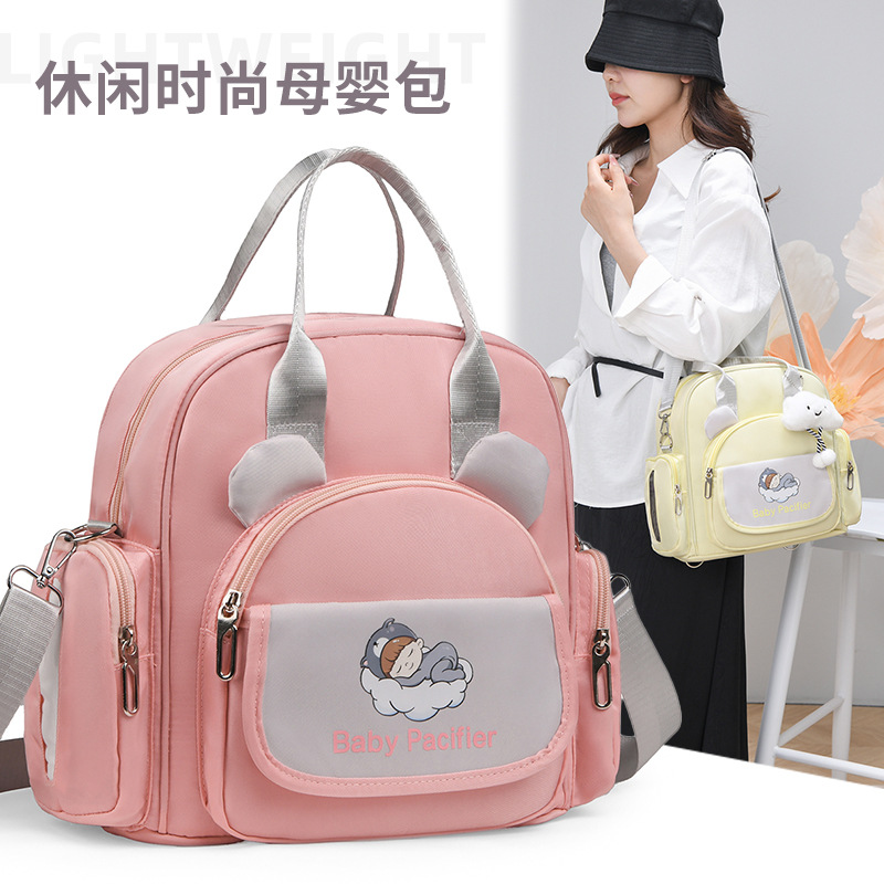Cartoon lightweight outdoor mommy bag, hand-held backpack, multi-functional outdoor single-shoulder casual and versatile crossbody bag full figure