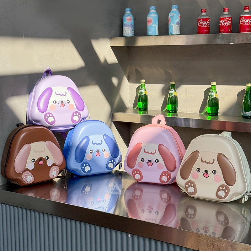 New cartoon and cute puppy backpacks for kindergarten babies, eggshell backpacks for boys and girls, and children's backpacks with lights full figure