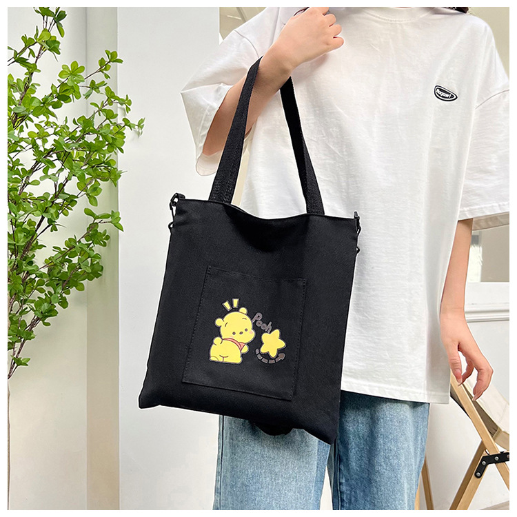 New high-appeartion-level hand-held tote bags are selling well, large-capacity single-shoulder crossbody bags, and wholesale canvas bags for junior and senior high school students Application Scenario