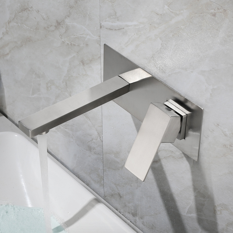 The bathroom washbasin is concealed and installed with a wall-mounted faucet. It is a stainless steel hotel washbasin faucet for cold and hot bathrooms details Picture