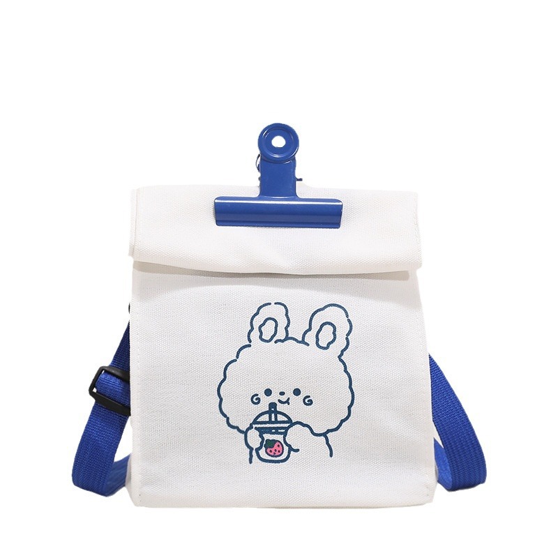 A versatile canvas bag for women in stock, a new student Korean version crossbody bag, a large-capacity Japanese style simple cartoon clip bag Item Picture