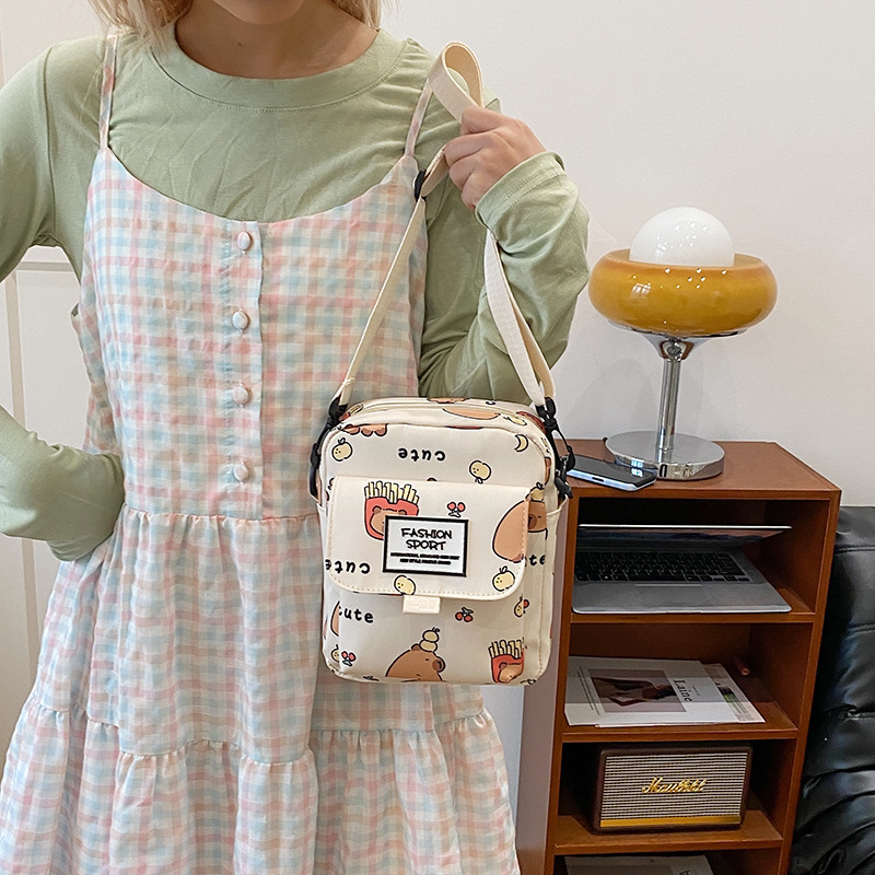 Cartoon animal print, many pockets, few bags, single-shoulder bag for girls, large capacity, cute graffiti, lightweight schoolbag for primary and middle school students Specification drawing