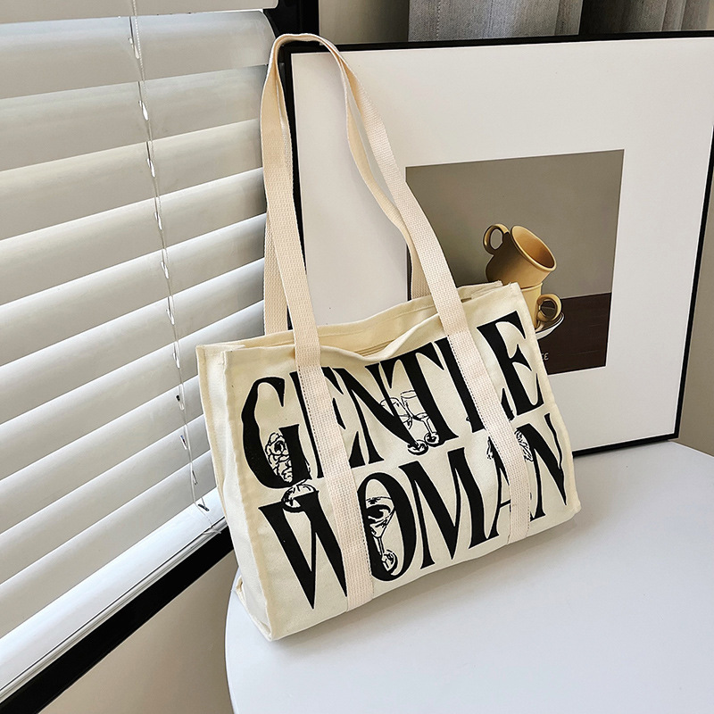Fashionable painted and printed canvas bag, versatile handbag, new lettered student tote bag, mommy single-shoulder bag details Picture
