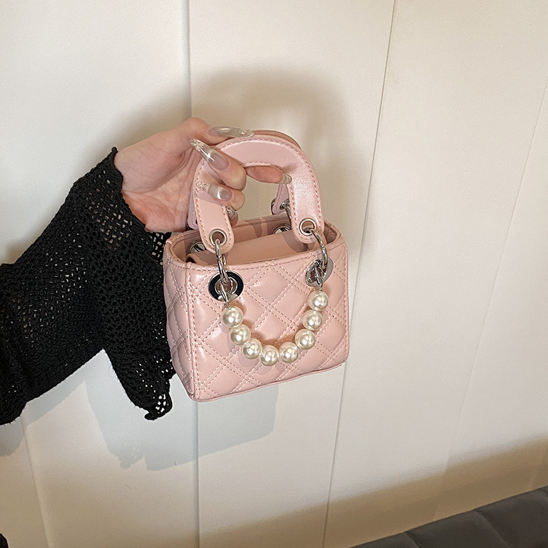 Cross-border summer new style European and American children's parent-child mini pearl hand-held crossbody accessory bag for women full figure