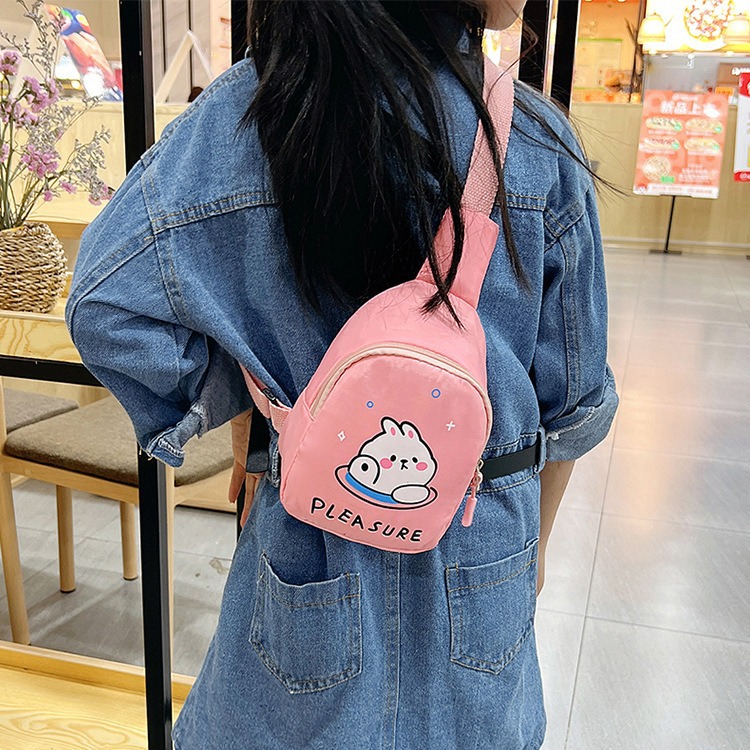 The cute little rabbit baby single-shoulder bag is selling well. The new children's coin purse is fashionable and simple. Wholesale of boys' and girls' chest bags Application Scenario