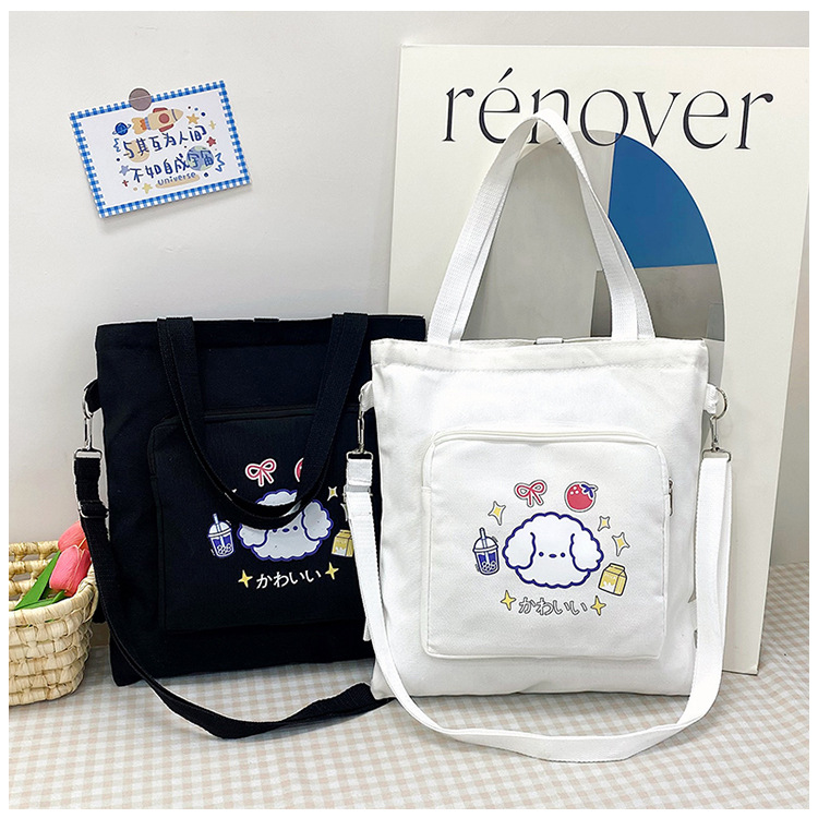 A new 2024 simple and casual single-shoulder bag with a large capacity and versatile cartoon canvas bag for girls details Picture