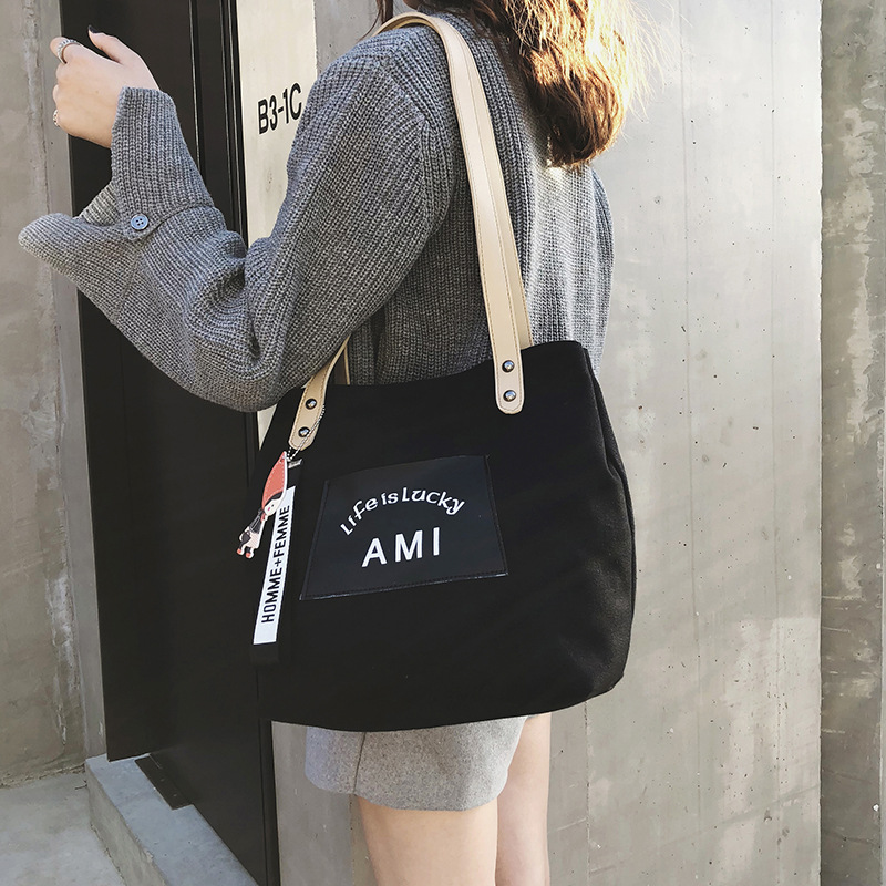2021 Autumn New Korean-style large-capacity canvas bag, simple and casual hand-held bag, shoulder bag, shopping bag, tote bag for women full figure