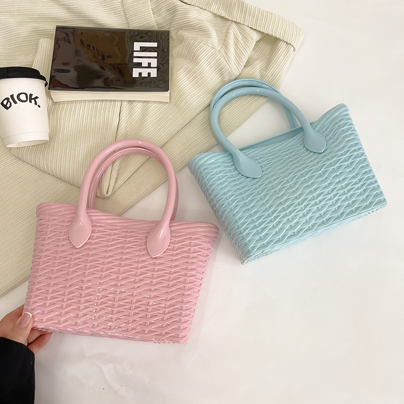 The 2025 summer new jelly bag with woven patterns and straw woven vegetable basket bag is simple, single-shoulder, slanted and has a large capacity for women details Picture
