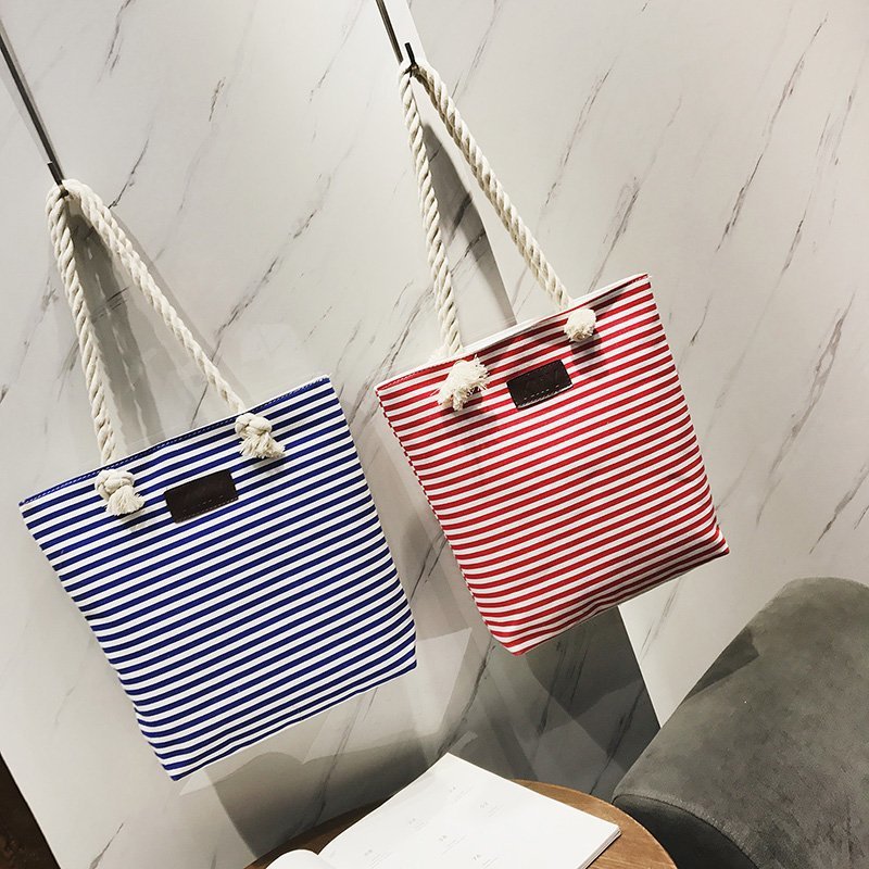 A new large-capacity hand-held and shoulder crossbody bag made of fashionable hemp rope canvas, a bag for artistic female students to attend classes, and a cross-border bag full figure