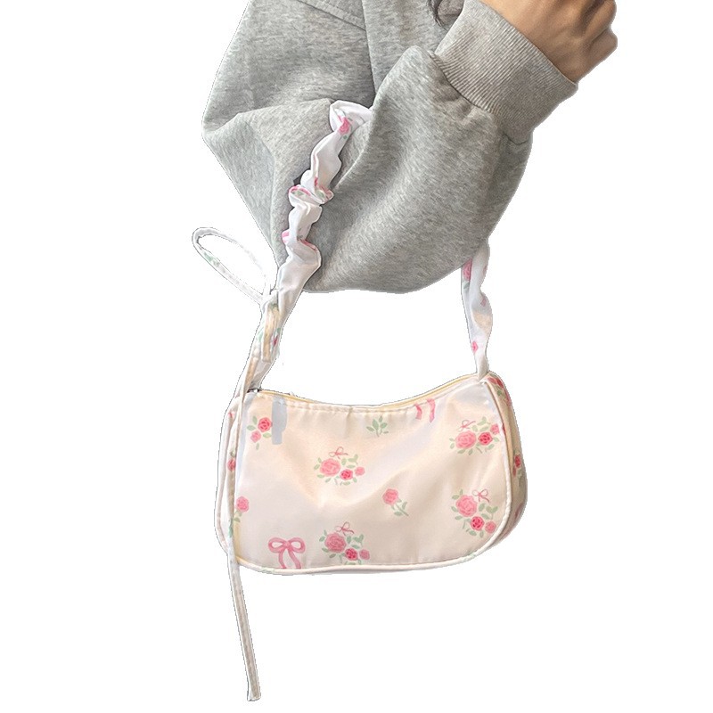Korean sweet underarm bag for women 2025 new style bow floral handbag, niche drawstring versatile shoulder bag Item Picture