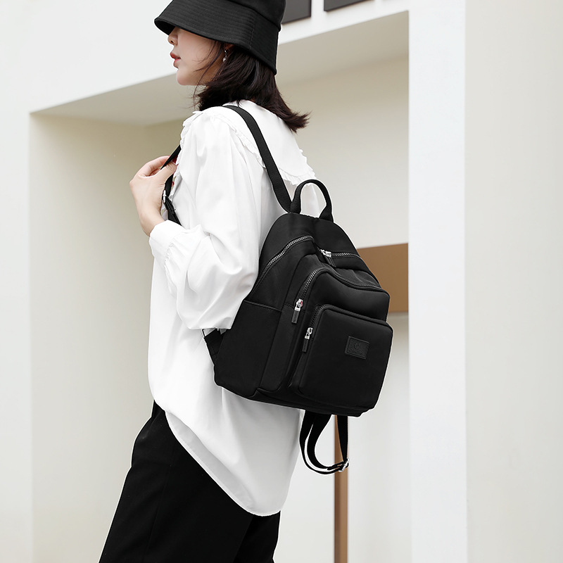 Colorful Fox's new backpack, a large-capacity casual backpack for women, is water-resistant and multi-layered for travel students details Picture