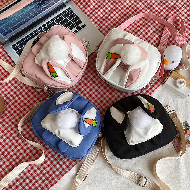 A new 2022 spring collection of fashionable, cute, trendy and unique rabbit color contrast simple and fresh single-shoulder crossbody bag for young girls full figure