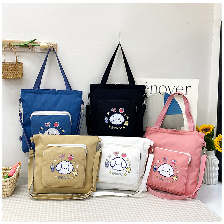 A new 2024 simple and casual single-shoulder bag with a large capacity and versatile cartoon canvas bag for girls full figure
