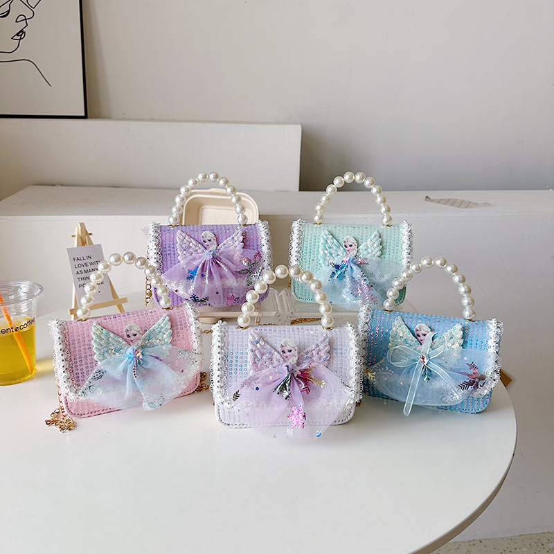 2025 New cute princess bag, pearl hand-held, fashionable and versatile, single-shoulder crossbody bag, coin purse, Korean version girl bag full figure