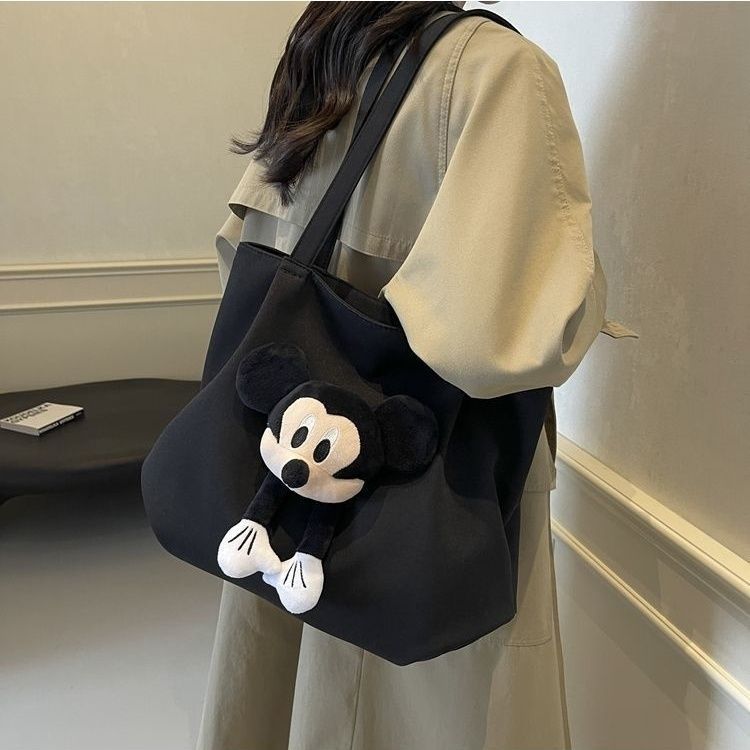 Relaxed canvas bag, women's large-capacity 2024 new cartoon casual single-shoulder bag, college student tote bag for class details Picture