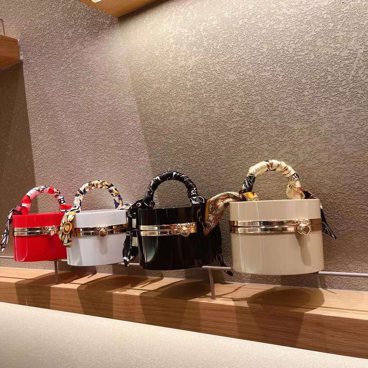 The 2025 new style women's bag is a trendy and fashionable candy-colored acrylic bag, a hand-held silk scarf, a lockable dinner bag, and a box bag full figure