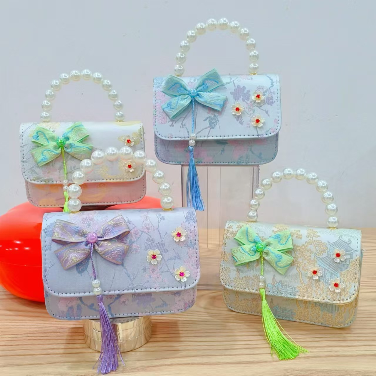 Cute pearl bow children's bag, new ancient-style tassel handbag, stylish colorful diamond-encrusted single-shoulder bag details Picture