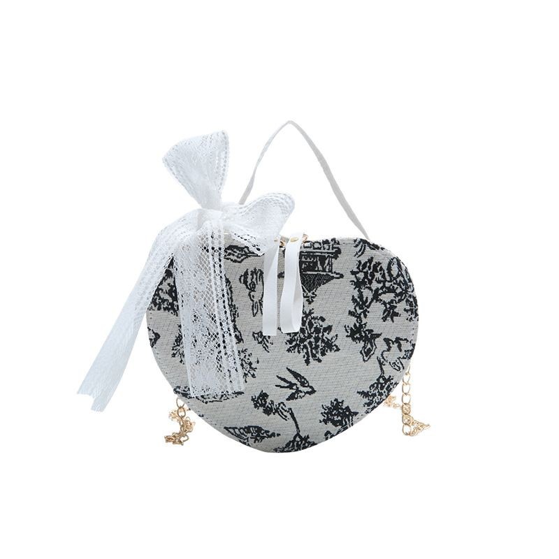 A new high-end heart-shaped bag, a fashionable and retro commuter single-shoulder bag with a large capacity and Chinese style, a hand-held crossbody bag for women Item Picture
