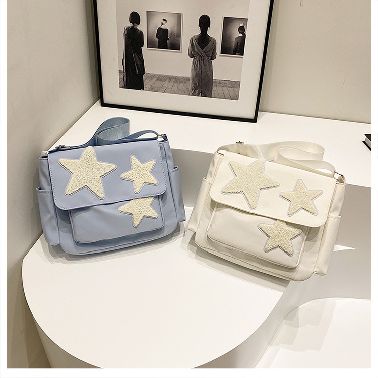 Cross-border wholesale large-capacity five-pointed star canvas single-shoulder bag, cute school style crossbody bag, student commuting bag for classes details Picture
