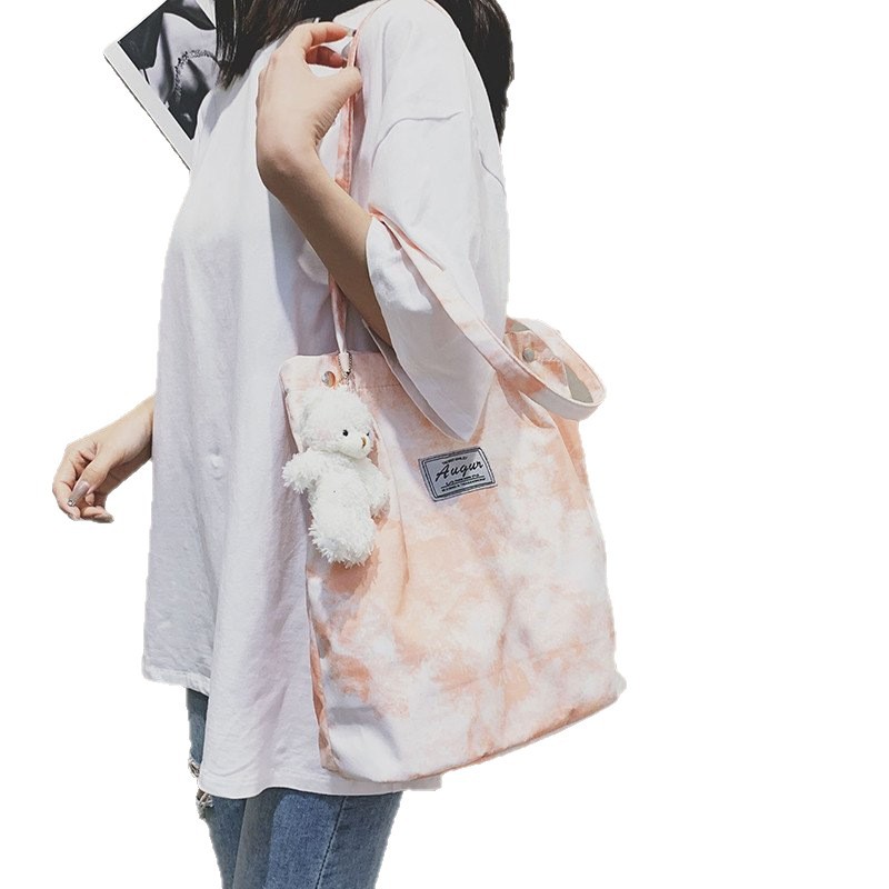 Wholesale of new Japanese-style versatile canvas bags, large-capacity fashionable and trendy single-shoulder bags, and gradient girlish tote bags Item Picture