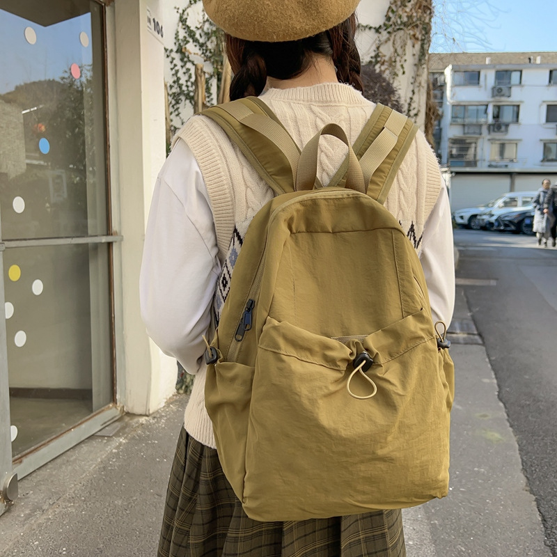 2025 Korean version New large-capacity nylon fabric backpack, lightweight and casual commuting backpack, Haraju-style student schoolbag full figure