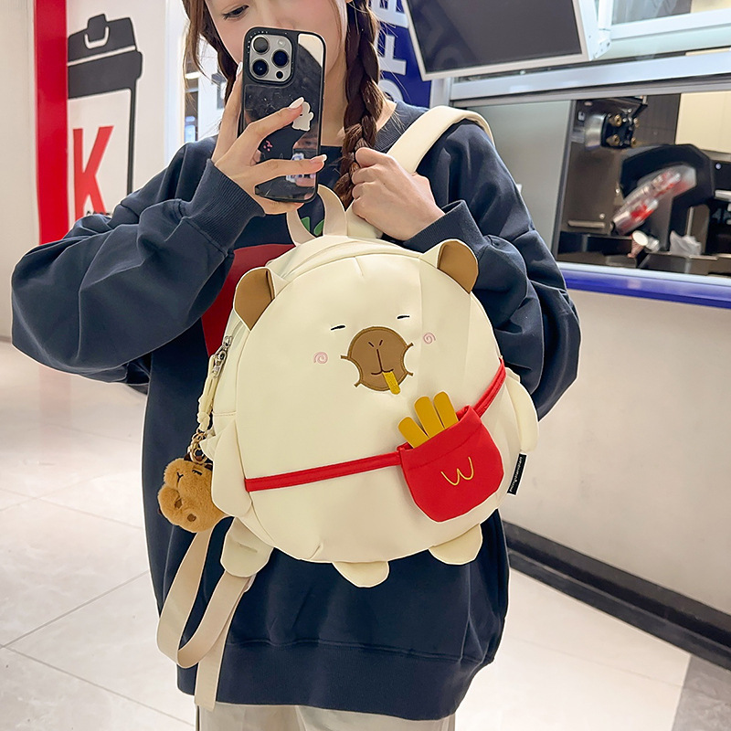 Fun and cute French fries Capibara backpack for girls and students, large-capacity cartoon water guinea pig children's schoolbag details Picture