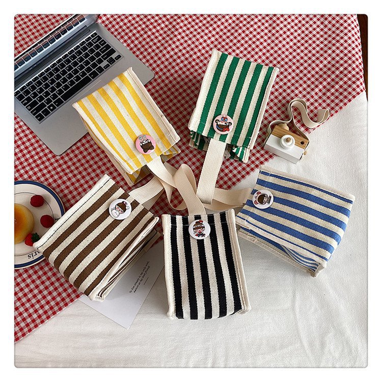 Cute style hand-held bento bags, lunch boxes, bags for going out, bags for carrying to work, student lunch bags manufacturer wholesale full figure