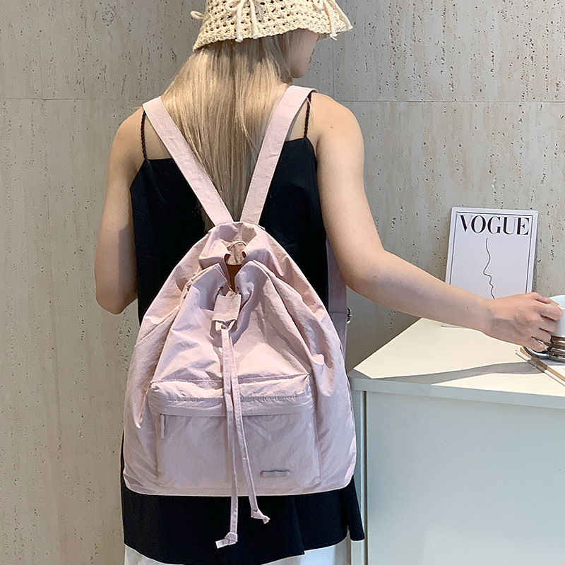 Colorful Fox Korean solid color simple and fresh student backpack, large-capacity ultra-light drawstring women's bag Application Scenario
