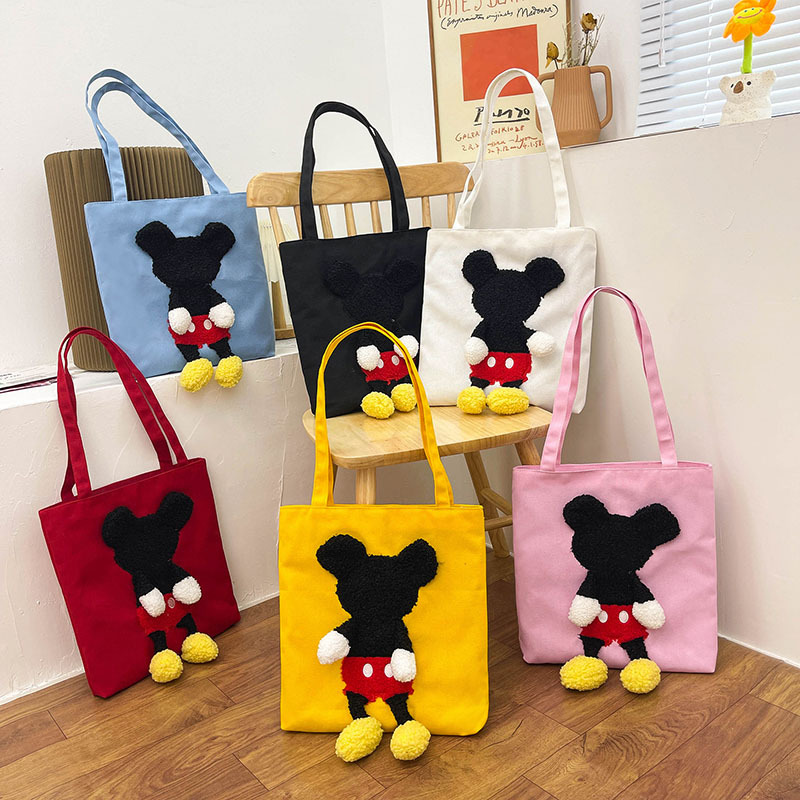 Korean-style retro single-shoulder bag for girls, Japanese-style Harajuku cute cartoon student hand-held class bag, fashionable canvas bag full figure