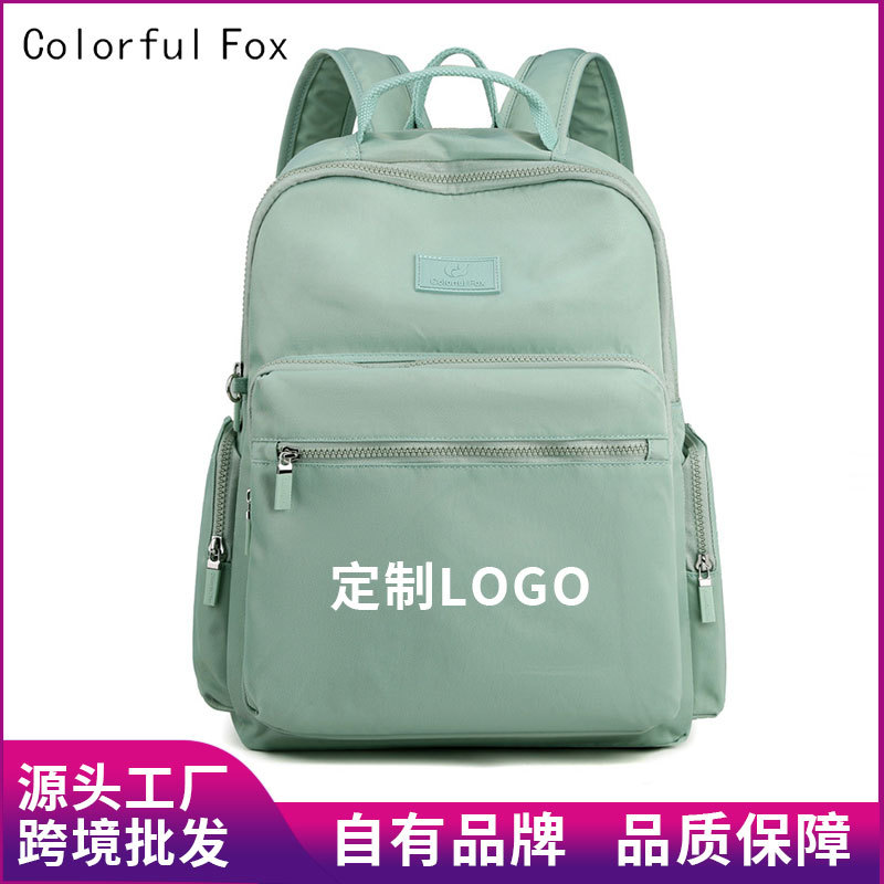 Customized cross-border backpacks with LOGO for travel, leisure and fashion, large-capacity water-resistant nylon backpacks for men and women full figure
