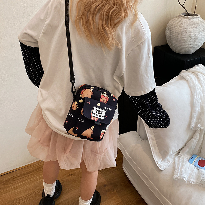 Cartoon animal print, many pockets, few bags, single-shoulder bag for girls, large capacity, cute graffiti, lightweight schoolbag for primary and middle school students details Picture