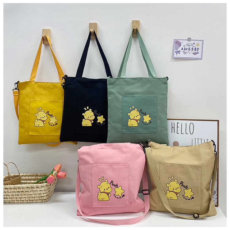 New high-appeartion-level hand-held tote bags are selling well, large-capacity single-shoulder crossbody bags, and wholesale canvas bags for junior and senior high school students full figure