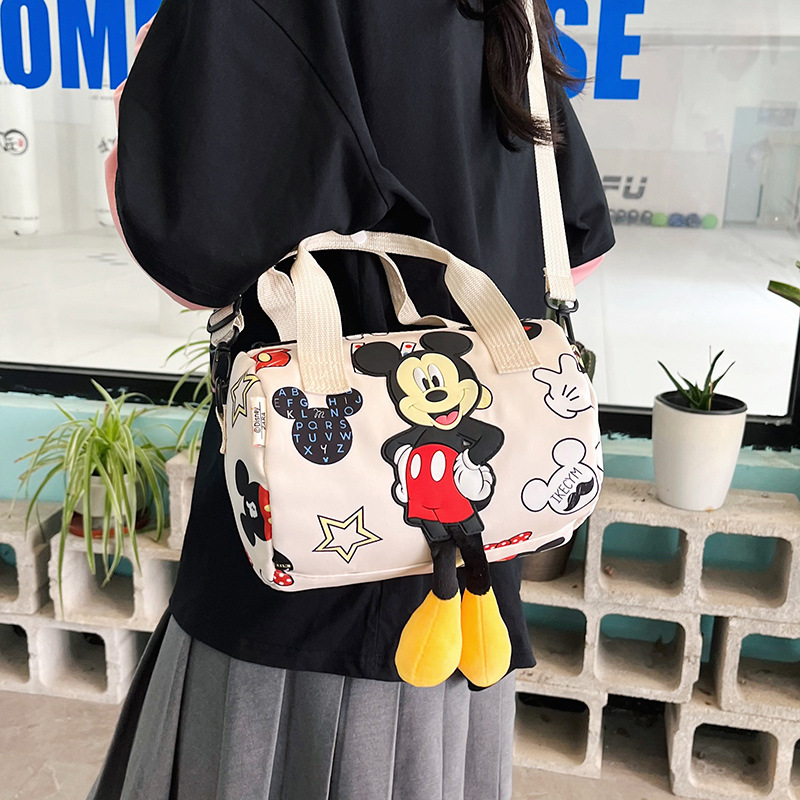 In 2024, the best-selling children's bags will feature cute Mickey Mouse-patterned bowling bags for girls, casual hand-held shoulder bags, and a unique style Specification drawing