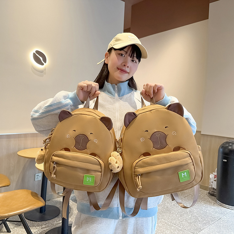 A cute, individualistic, trendy and simple backpack for female college students in the spring of 2025, with a large capacity for casual wear full figure