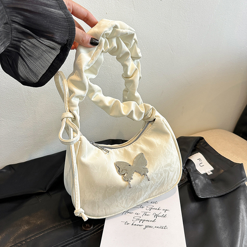 A niche design crossbody bag, a new summer casual drawstring bow single-shoulder bag, a versatile and casual single-shoulder underarm bag details Picture