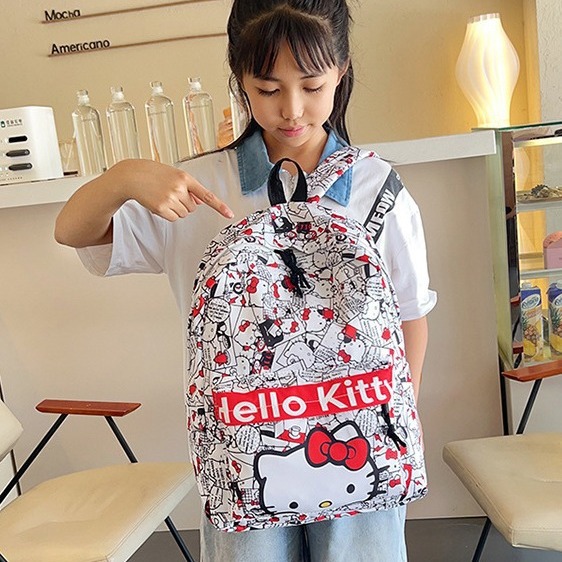 New campus cute kt niche versatile schoolbag with printed graffiti, a lightweight and large-capacity backpack for girls details Picture
