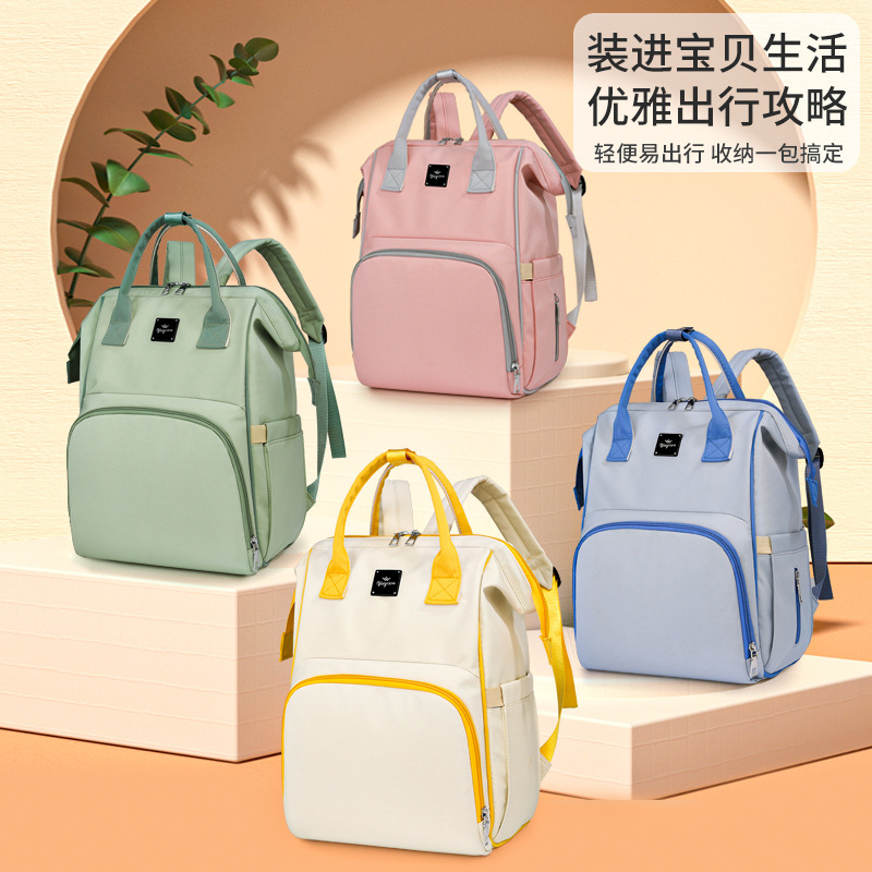 Mummy Bag, a multi-functional, large-capacity, fashionable hand-held baby and mother bag for both shoulders, is portable and easy to store when going out full figure