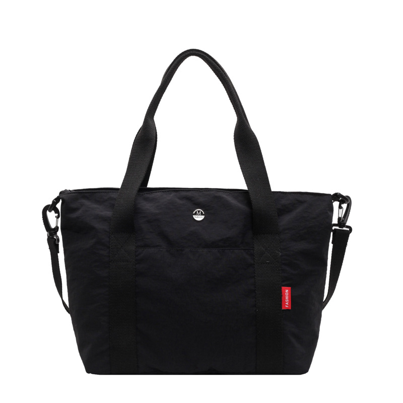 The large-capacity hand-held crossbody bag for women, the new 2024 lightweight and casual single-shoulder bag for students' commuting to school, is selling well Item Picture