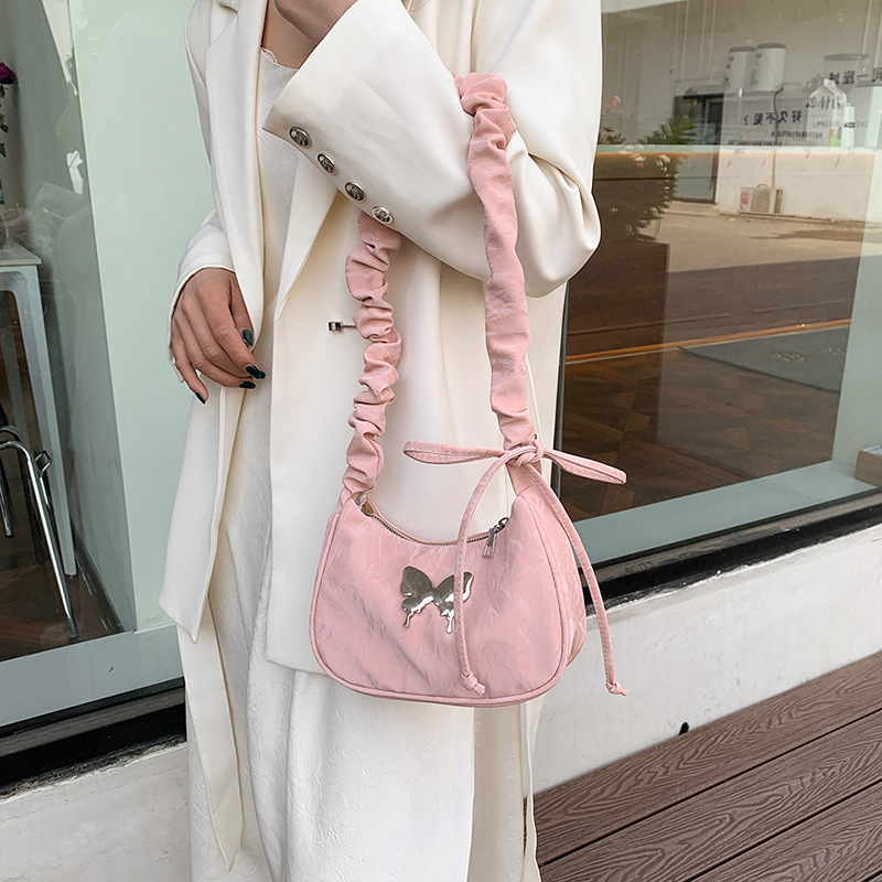 A niche design crossbody bag, a new summer casual drawstring bow single-shoulder bag, a versatile and casual single-shoulder underarm bag Application Scenario