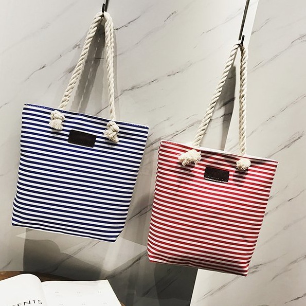 A new large-capacity hand-held and shoulder crossbody bag made of fashionable hemp rope canvas, a bag for artistic female students to attend classes, and a cross-border bag Specification drawing