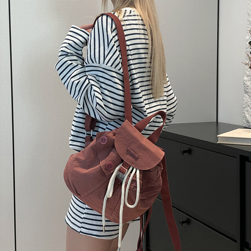 Colorful Fox's new Korean-style ins women's niche design lightweight pocket button drawstring backpack Specification drawing