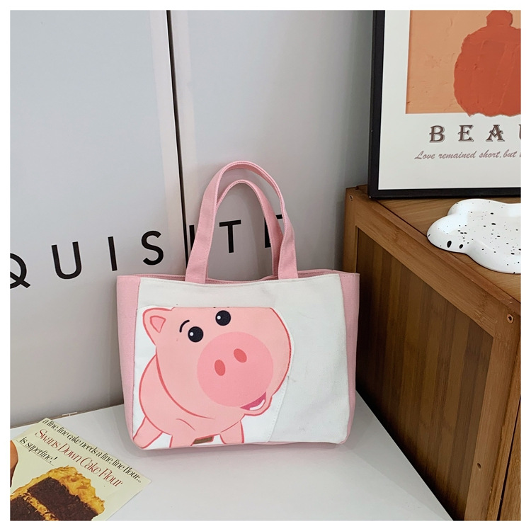 Cute cartoon printed small bag, 2024 summer new style hand-held piggy girl handbag, student storage canvas bag Specification drawing