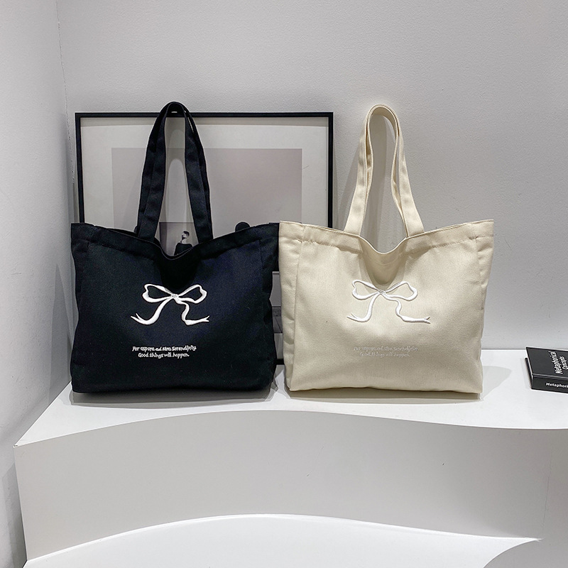 A large-capacity, simple tote bag for spring, a versatile and fashionable single-shoulder bag for commuting, a laid-back style handbag for women full figure