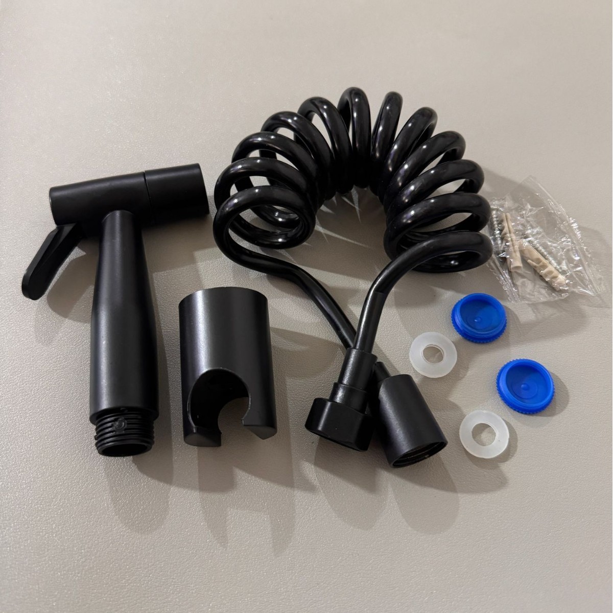 Grey high-pressure spray gun companion, bathroom flushing, handheld nozzle, toilet, feminine wash, small showerhead Application Scenario