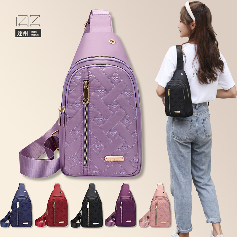 The new women's embroidered nylon chest bag is fashionable and versatile. The embroidered checkered crossbody bag is a simple outdoor travel daily women's bag full figure