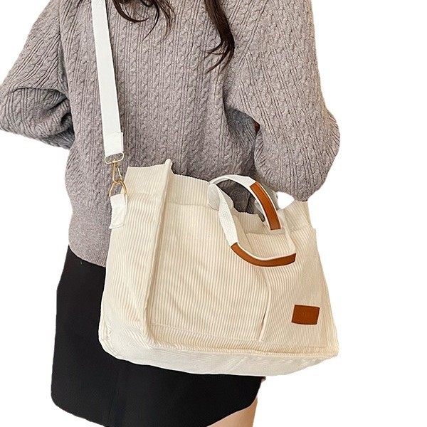 Large-capacity single-shoulder bag, 2024 new style trendy and versatile down crossbody bag, shoulder strap handbag, tote hand-held canvas bag Item Picture