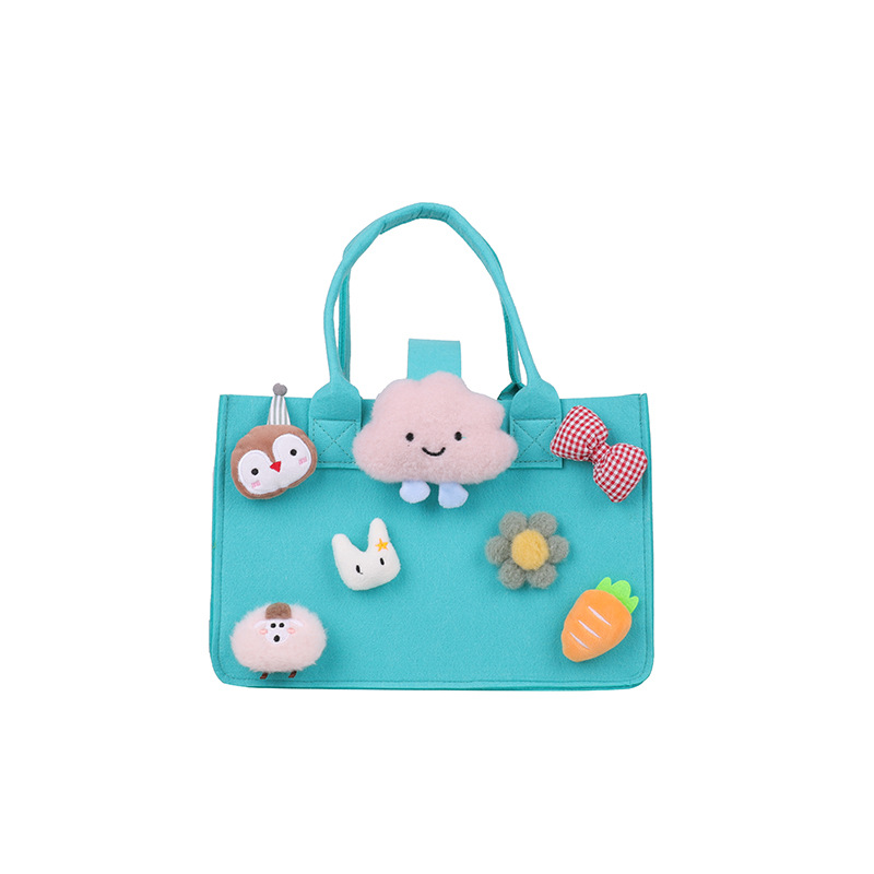 Wholesale of new cartoon felt bags for children's 100th birthday party souvenirs, trendy hand-held wedding gift bags Item Picture